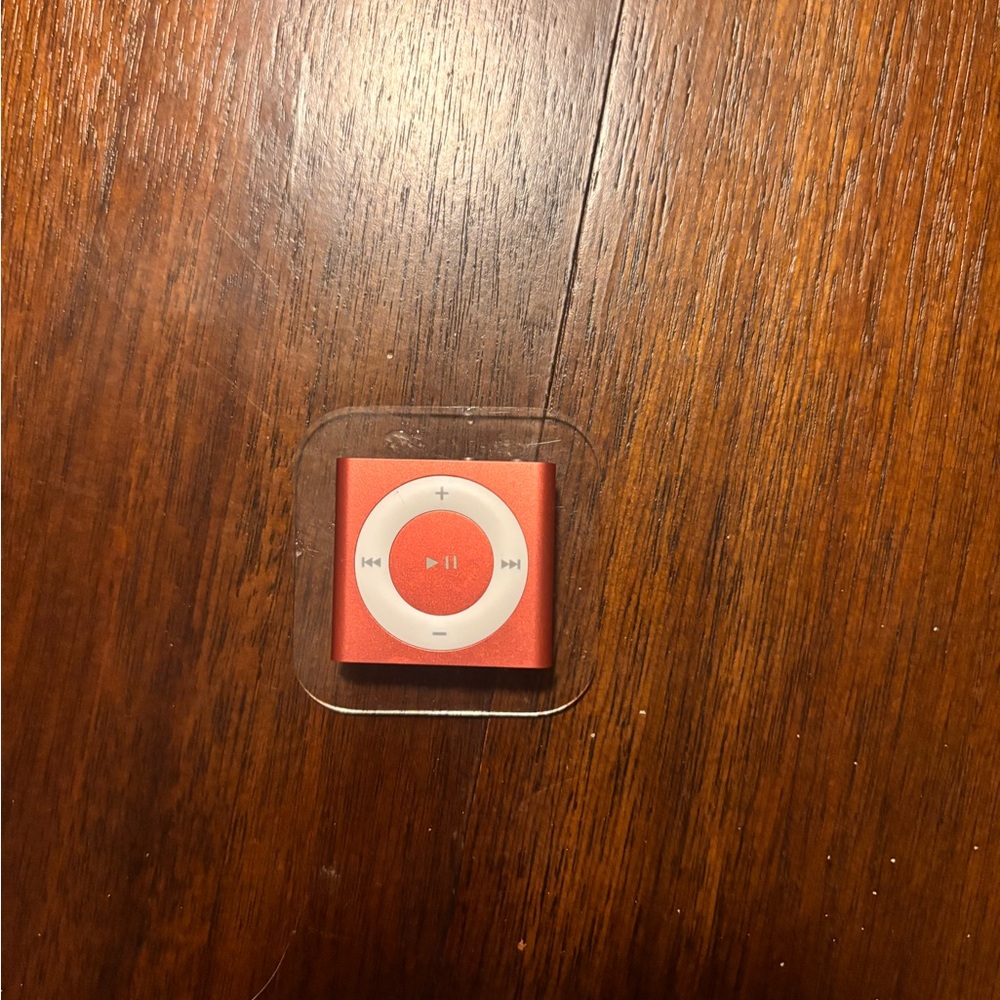 Apple Red Music Device with White Controls
